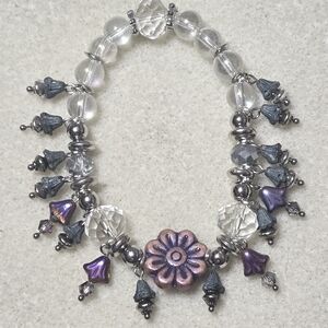 Chrystal Clear & Silver Beads  Surround A Pink/Purple Flower  W/irrid. Dangles